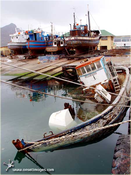 Sunken fishing trawler in Hout Bay harbour